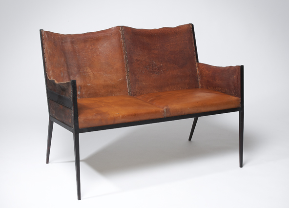 Iconic leather seat. “Throw out and keep throwing out. Elegance means elimination.” JM Frank
